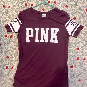 maroon t-shirt with white logo and striped sleeves from Pink!
